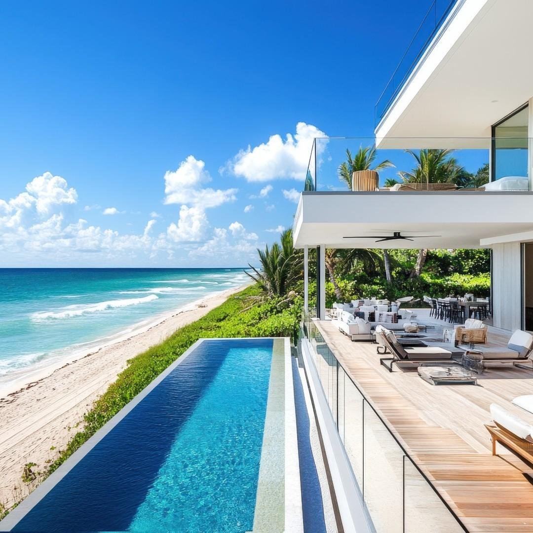 Luxurious beachfront villa with a stunning pool and ocean view.